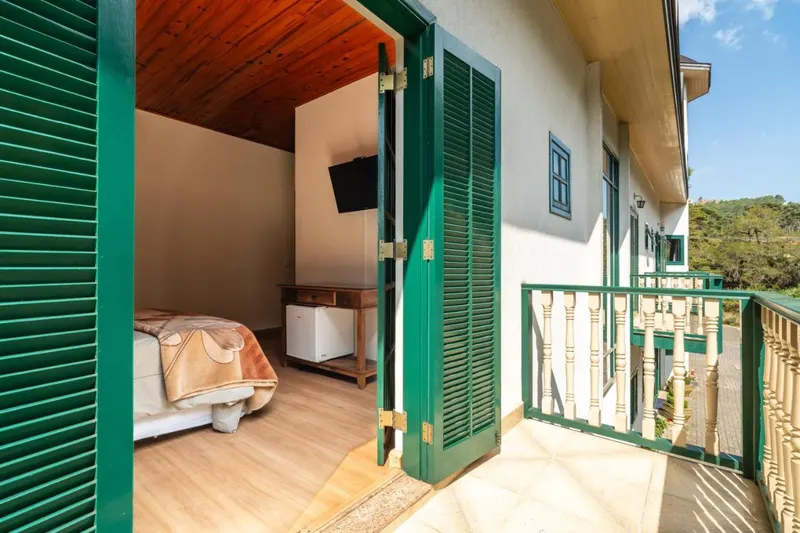 Quarto em Castelo Piazzale by Concavus