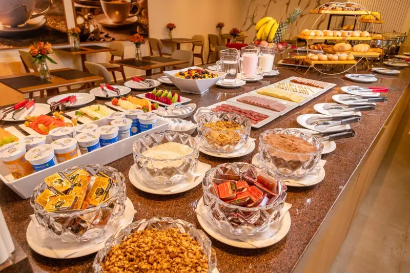 Café da manhã e refeições em Champet Boutique Hotel