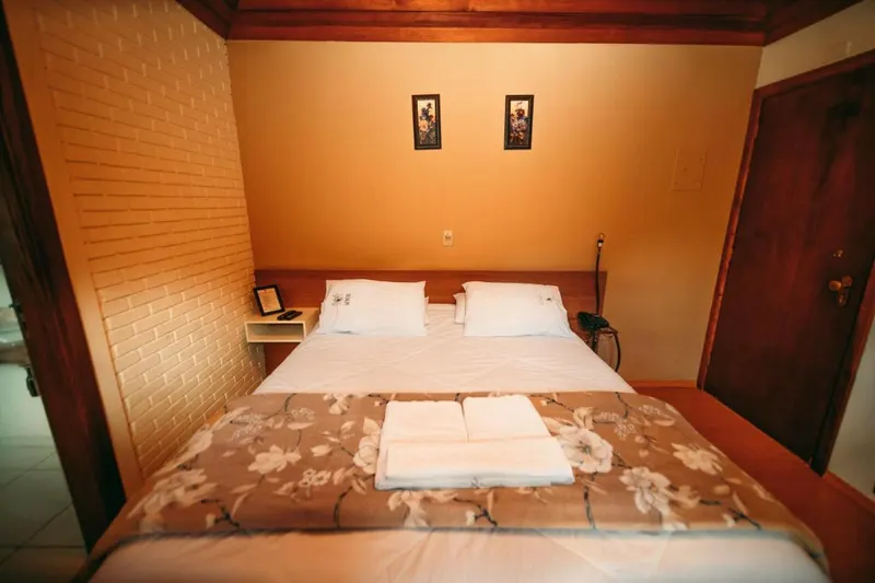 Quarto em Hotel Geneve