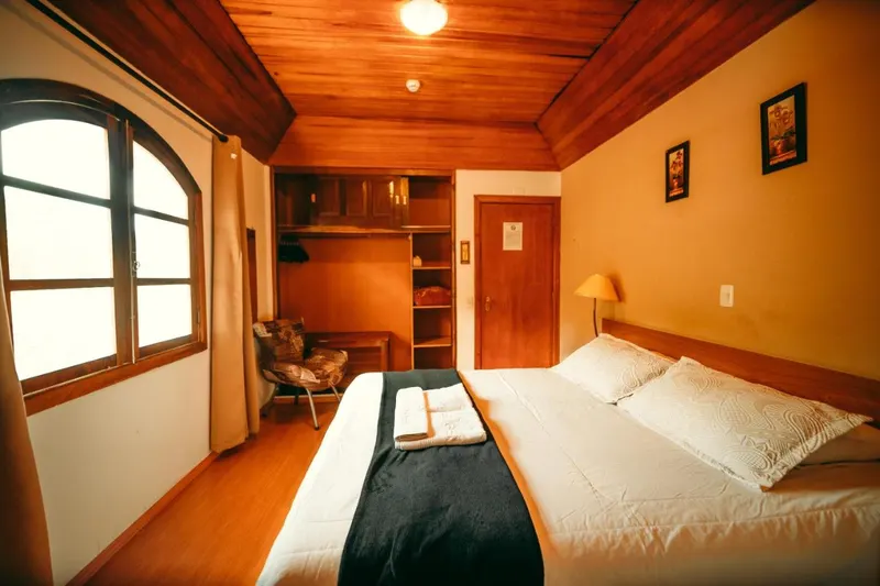 Quarto em Hotel Geneve