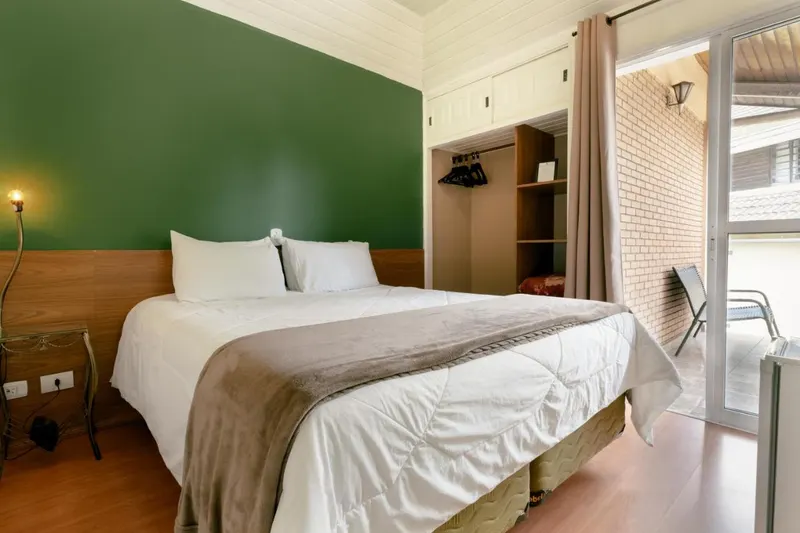 Quarto em Hotel Geneve