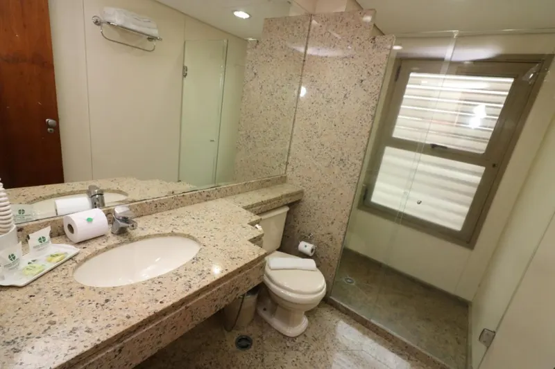 Banheiro em Hotel Nacional Inn