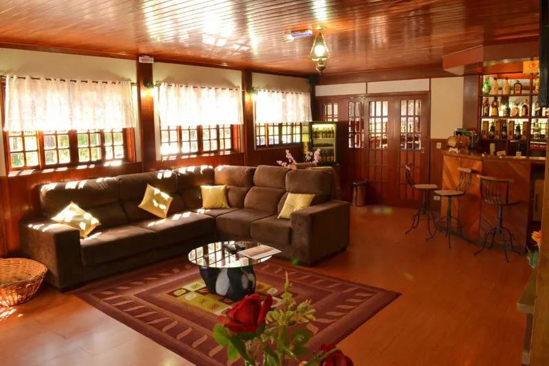 Área comum de Hotel Refugio Alpino