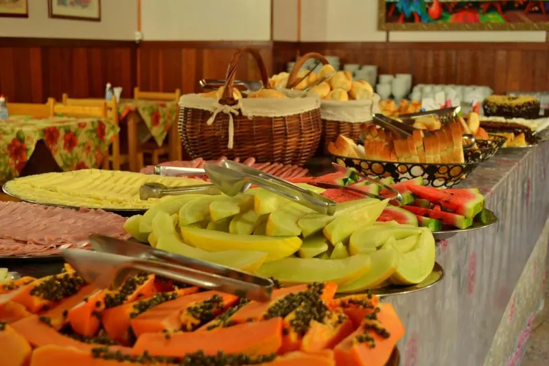 Café da manhã e refeições em Hotel Refugio Alpino