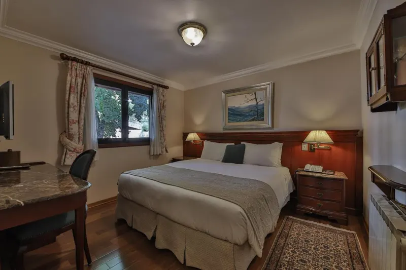 Quarto em Le Suisse Elegance Hotel