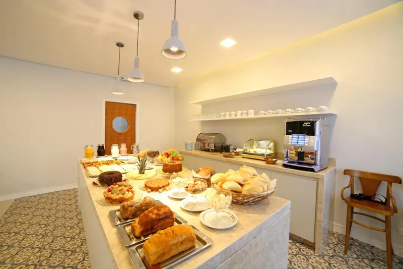 Café da manhã e refeições em Moinho Itália Hotel