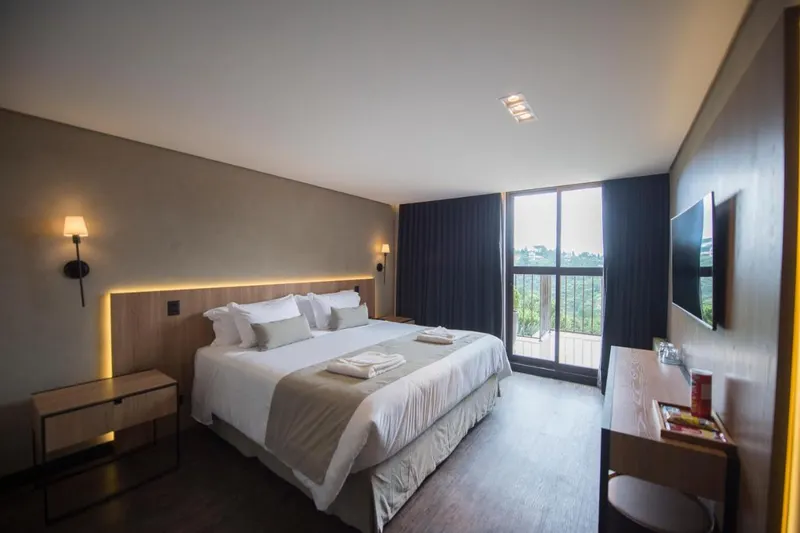 Quarto em Pinot Hotel