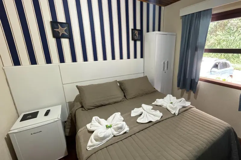 Quarto em Pousada Atalaia Capivari
