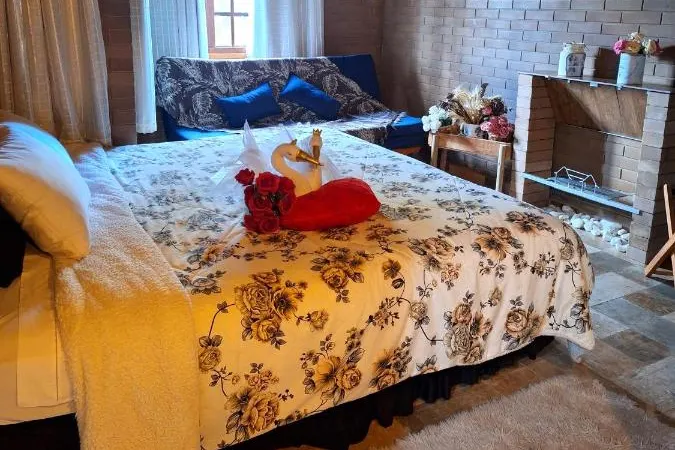 Quarto em Pousada Groms Village
