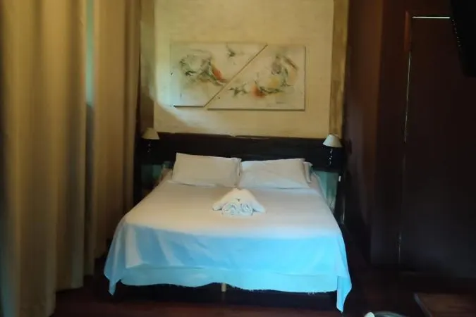Quarto em Pousada Pássaro de Fogo