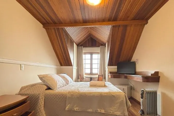 Quarto em Pousada Portal das Cerejeiras
