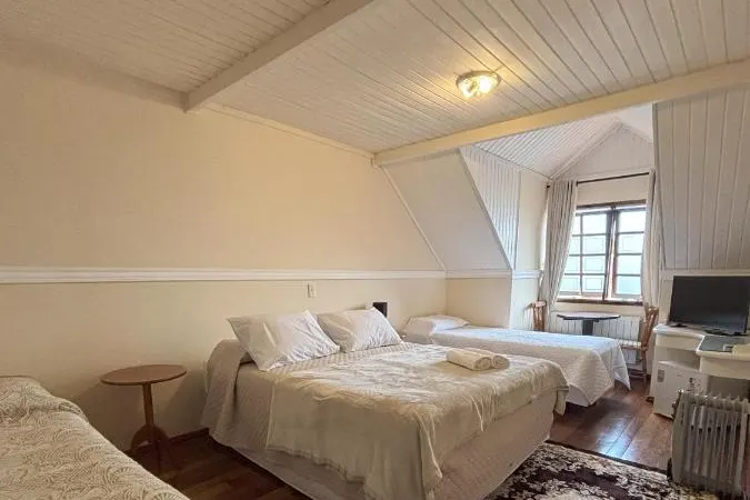 Quarto em Pousada Portal das Cerejeiras