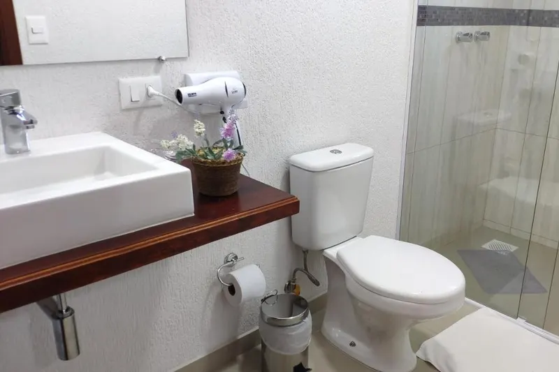 Banheiro em Pousada Recanto Feliz