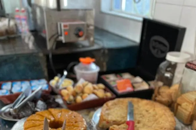 Café da manhã e refeições em Pousada Vila Tio Lé