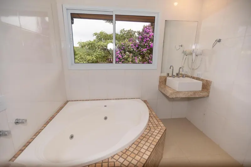 Banheiro em Pousada Villa Hegus