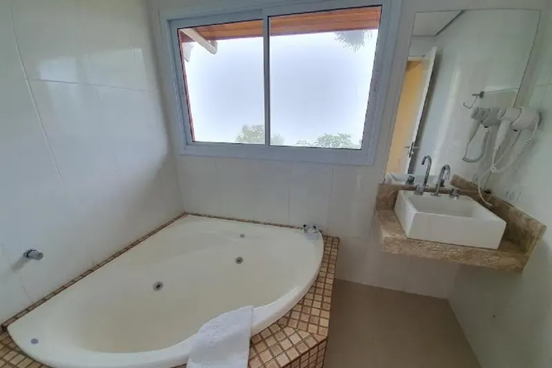 Banheiro em Pousada Villa Hegus