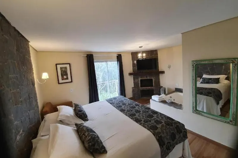 Quarto em Pousada Villa Hegus